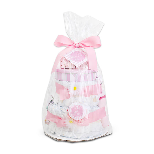 Gift bag with pink ribbons and baby-themed items on a white background
