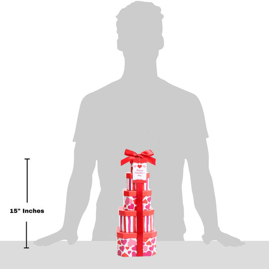 Stack of gift boxes with a red ribbon shown next to a silhouette of a person for size reference.