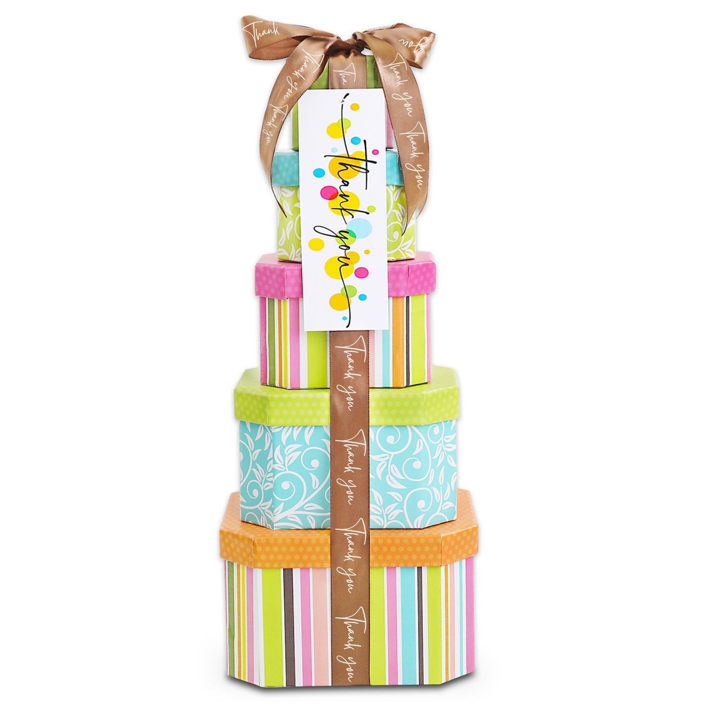 Stack of colorful gift boxes with a ribbon and decorative tag on a white background