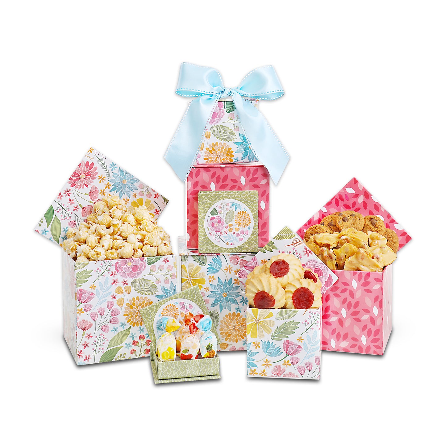 Set of floral gift boxes with snacks on a white background