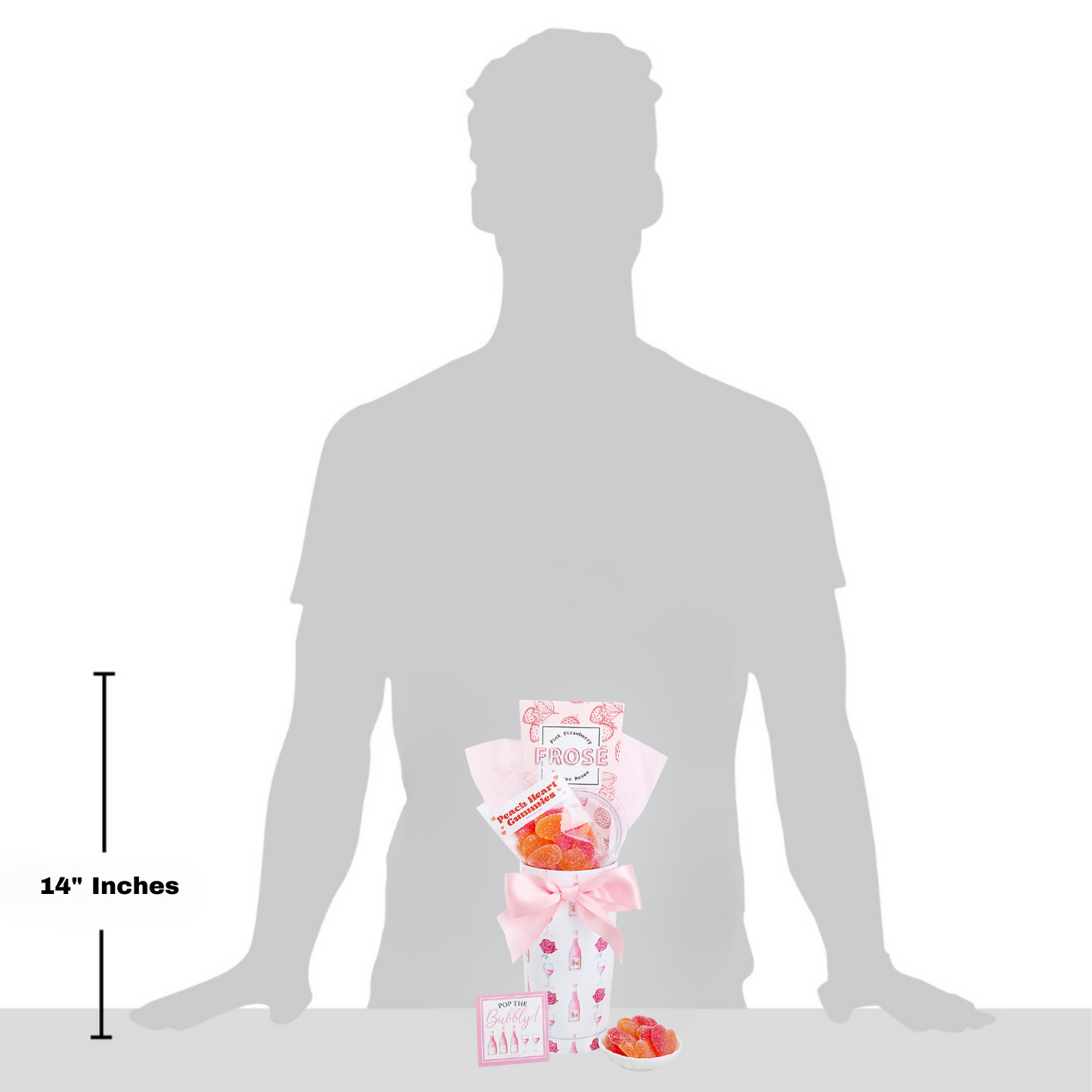 Silhouette of a person with a bouquet of flowers and packaging, showing the size relative to a 14-inch measurement.