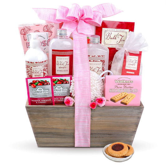 Gift basket with bath products and cookies on a white background
