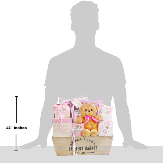 Gift basket with teddy bear and products on a silhouette of a person, showing its size.