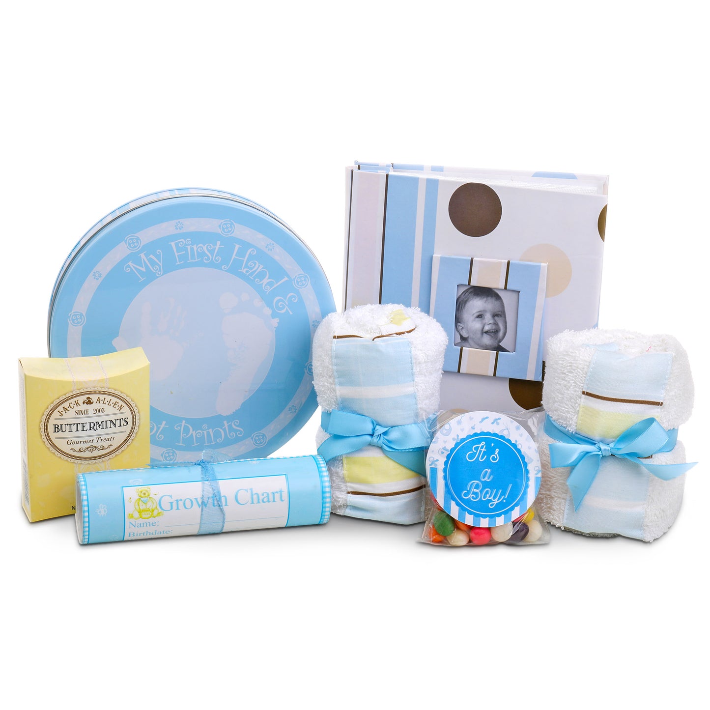Collection of baby items including a growth chart, cookies, and photo album on a white background