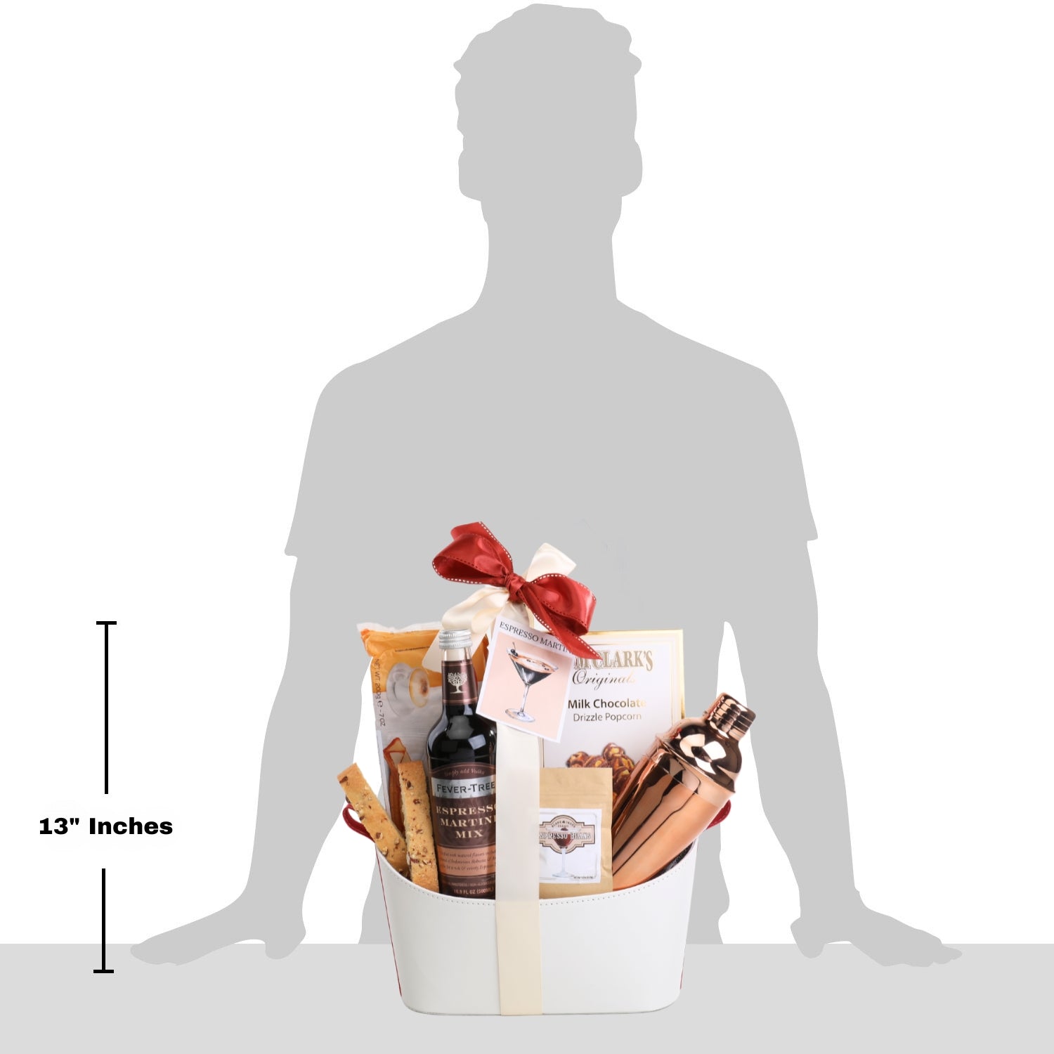 Gift basket with a red ribbon shown next to a silhouette of a person for size reference.