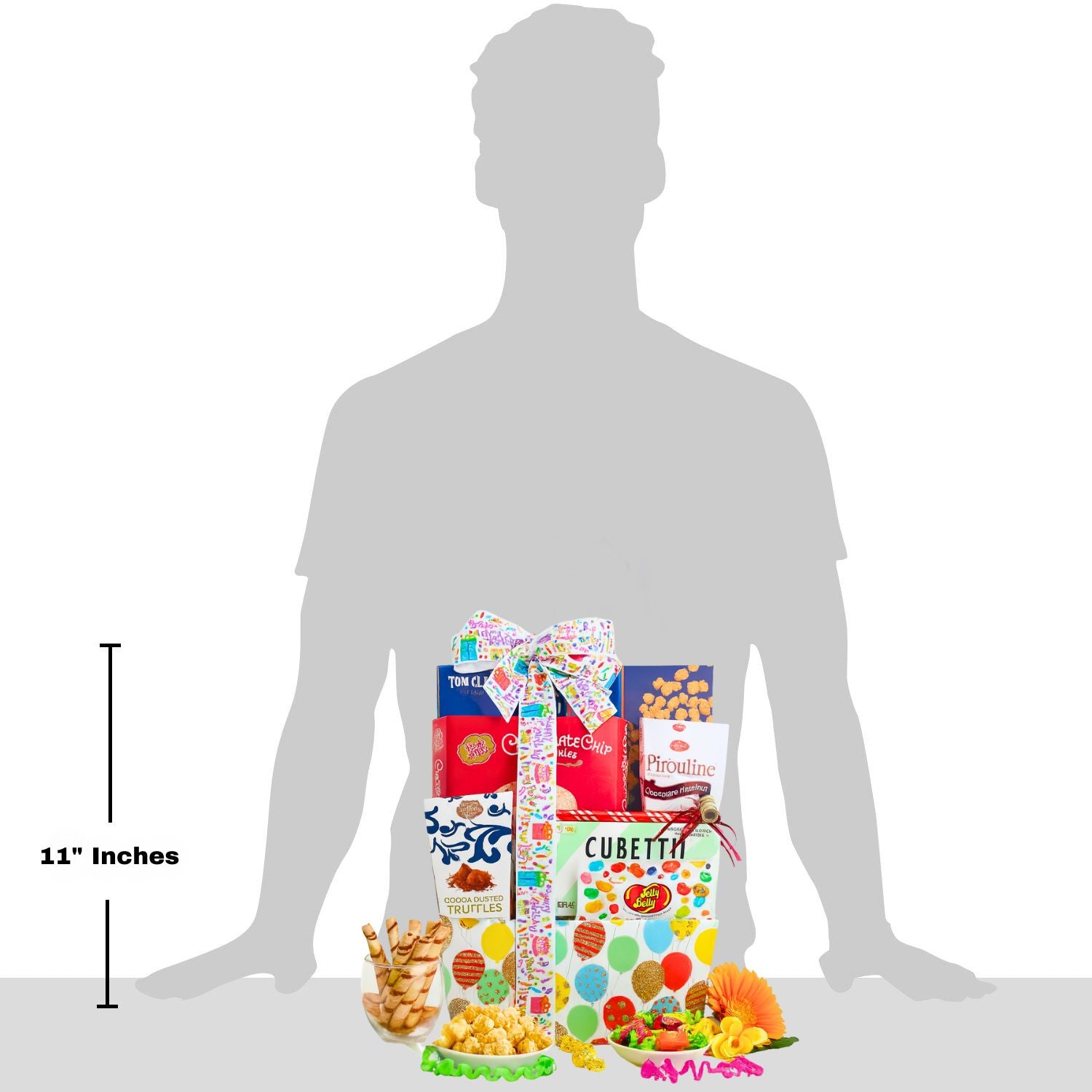 Gift basket with colorful packaging on a white background with a silhouette of a person for scale.