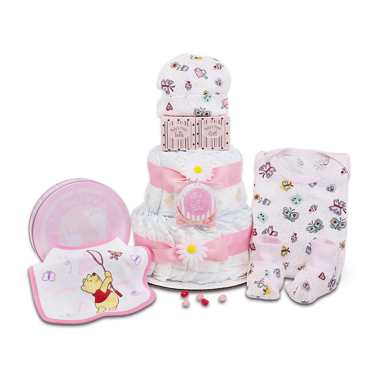 Baby gift set with diaper cake, bib, booties, and hat on a white background
