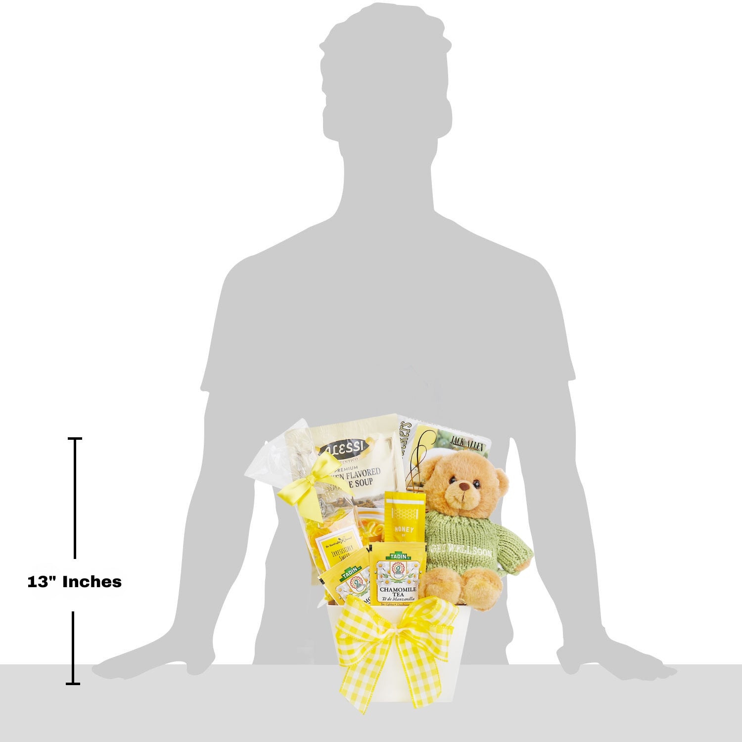 Gift basket with teddy bear and snacks on a silhouette of a person, showing size with '13 inches' label.