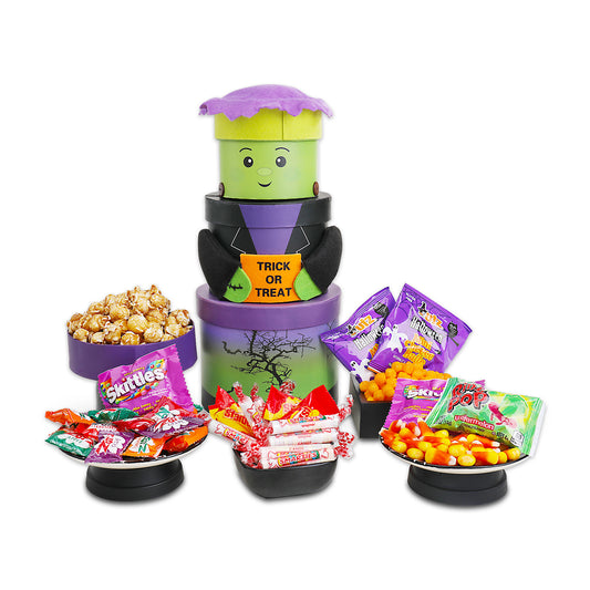 Frankenstien Tower displayed with snack and candy contents on white background
