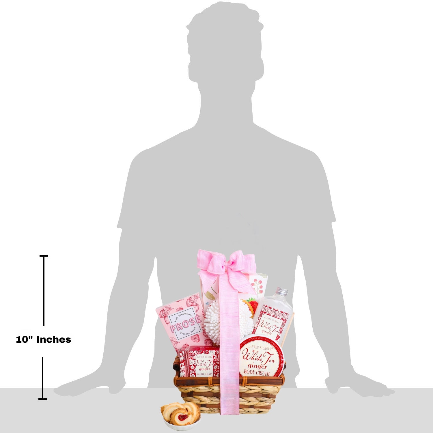 Gift basket with pink ribbon and items on a silhouette of a person, showing its size.