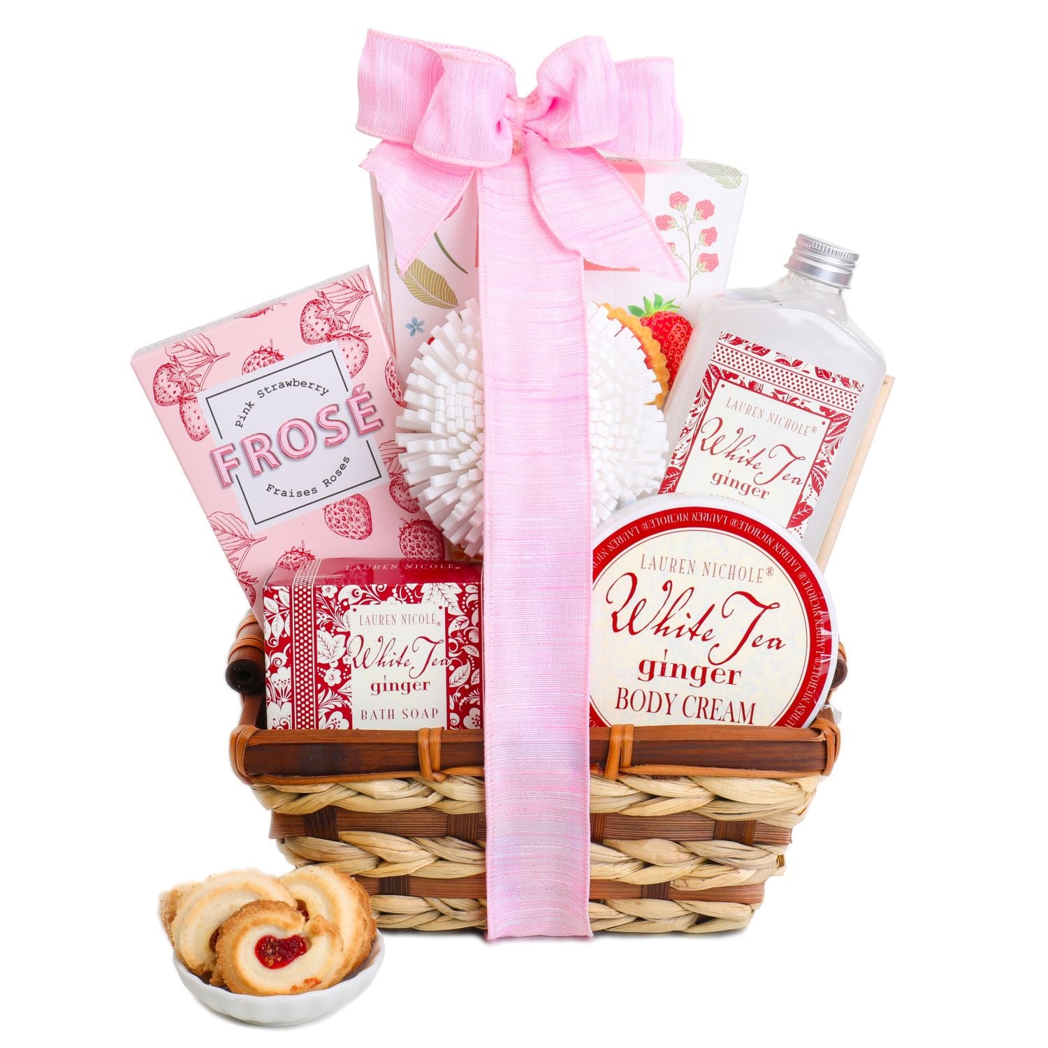Gift basket with body cream, soap, and cookies on a white background