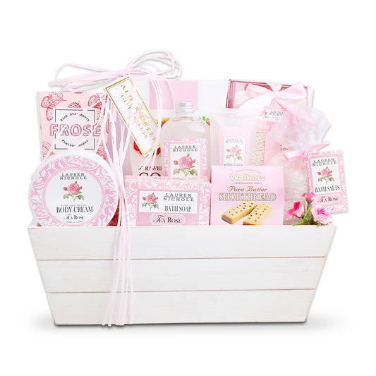 Gift basket with pink and white products on a white background