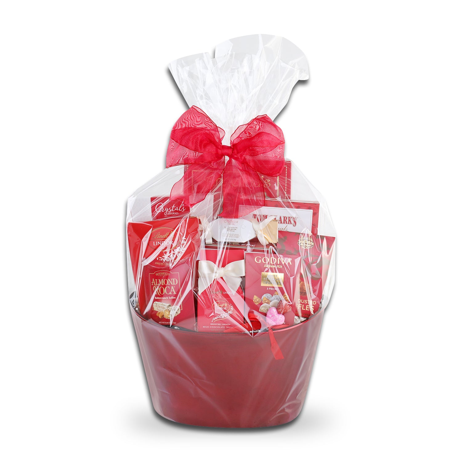 Gift basket wrapped in plastic and tied with red bow