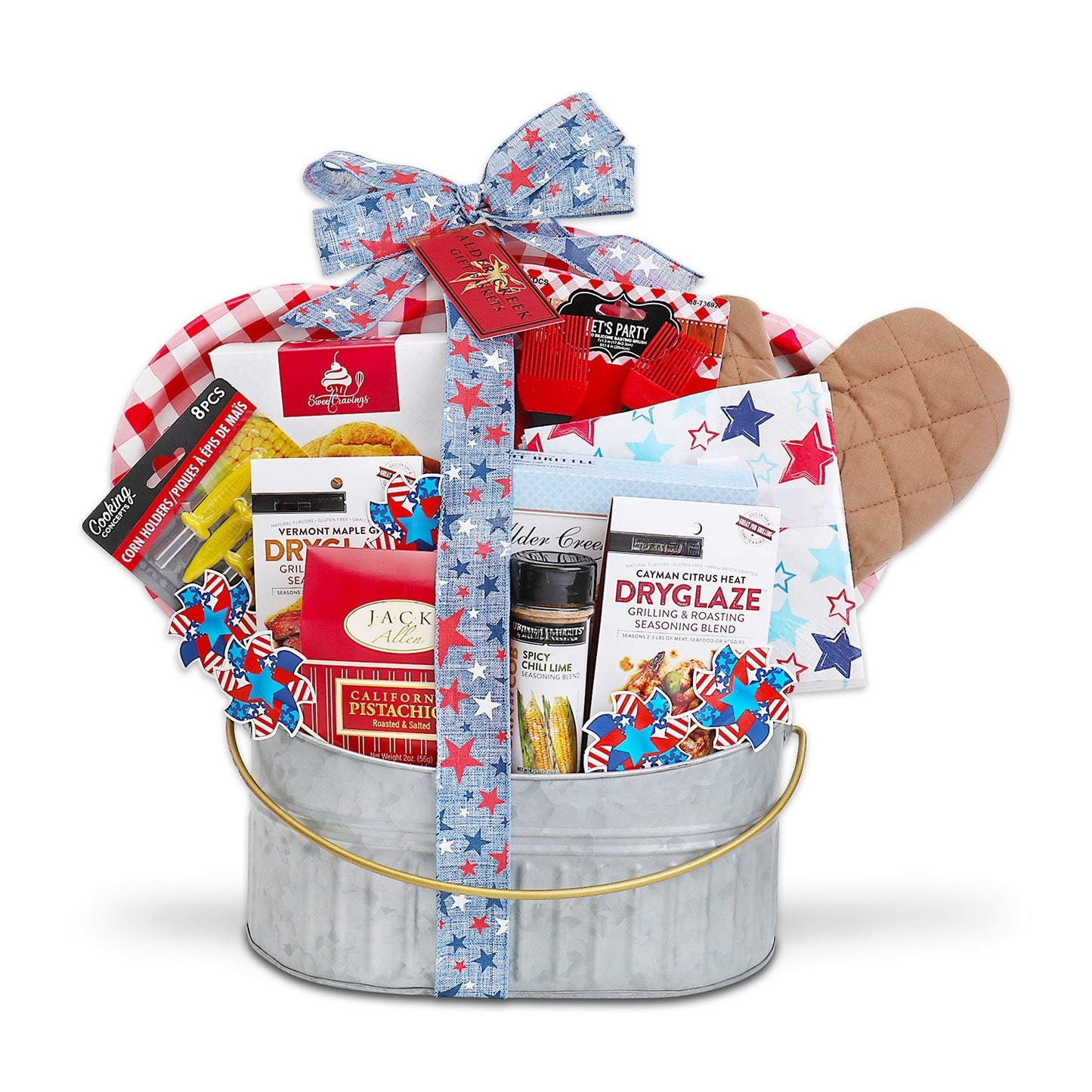 Gift basket with snacks, a bottle of seasoning and more on a white background