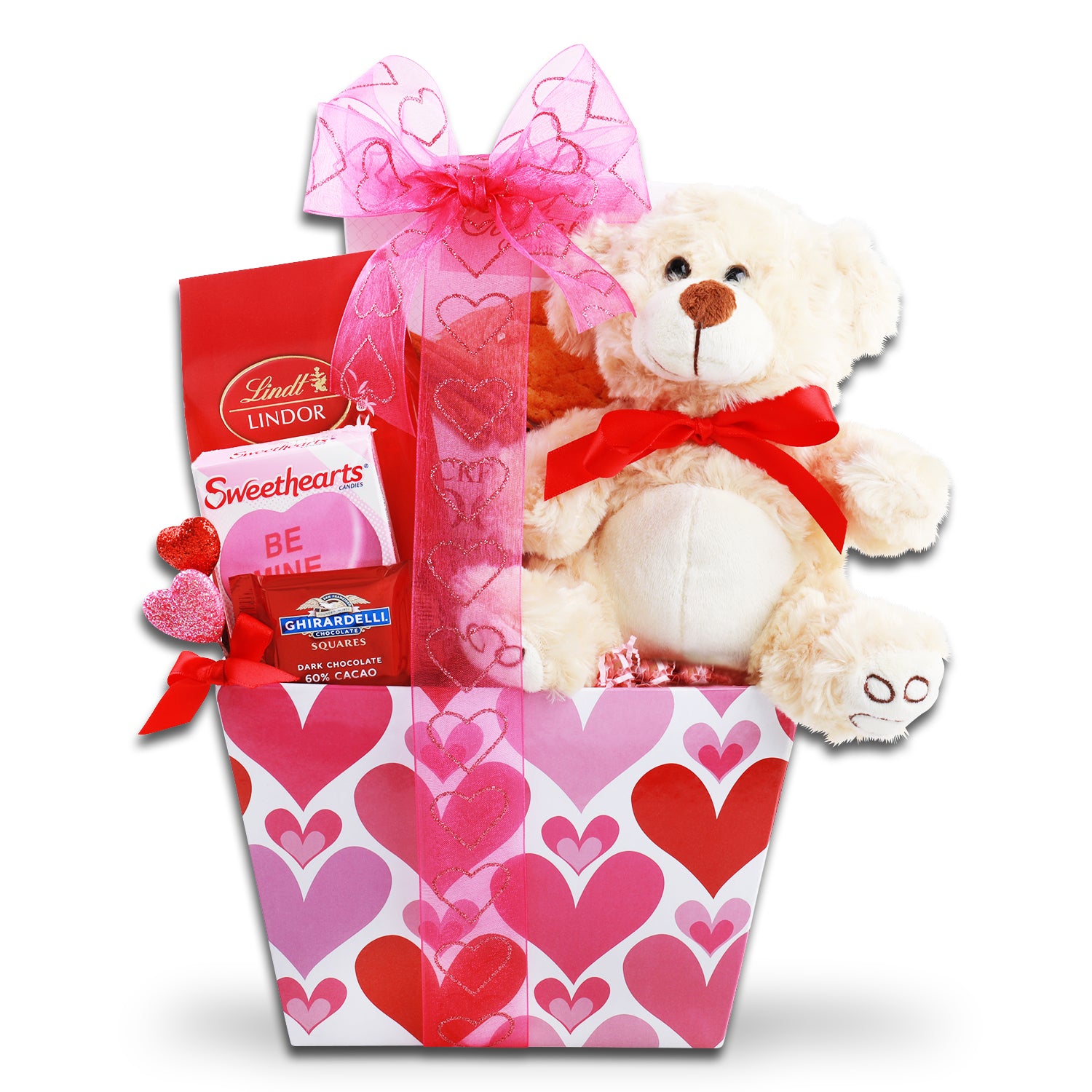 Gift basket iwth contents displayed. Include light tan plush bear and pink heart ribbon