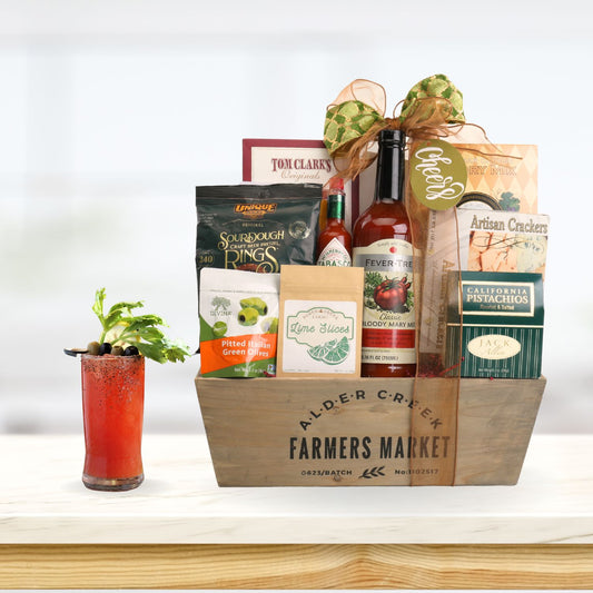 Gift basket from Alder Creek Farmers Market with a Bloody Mary cocktail on a white background