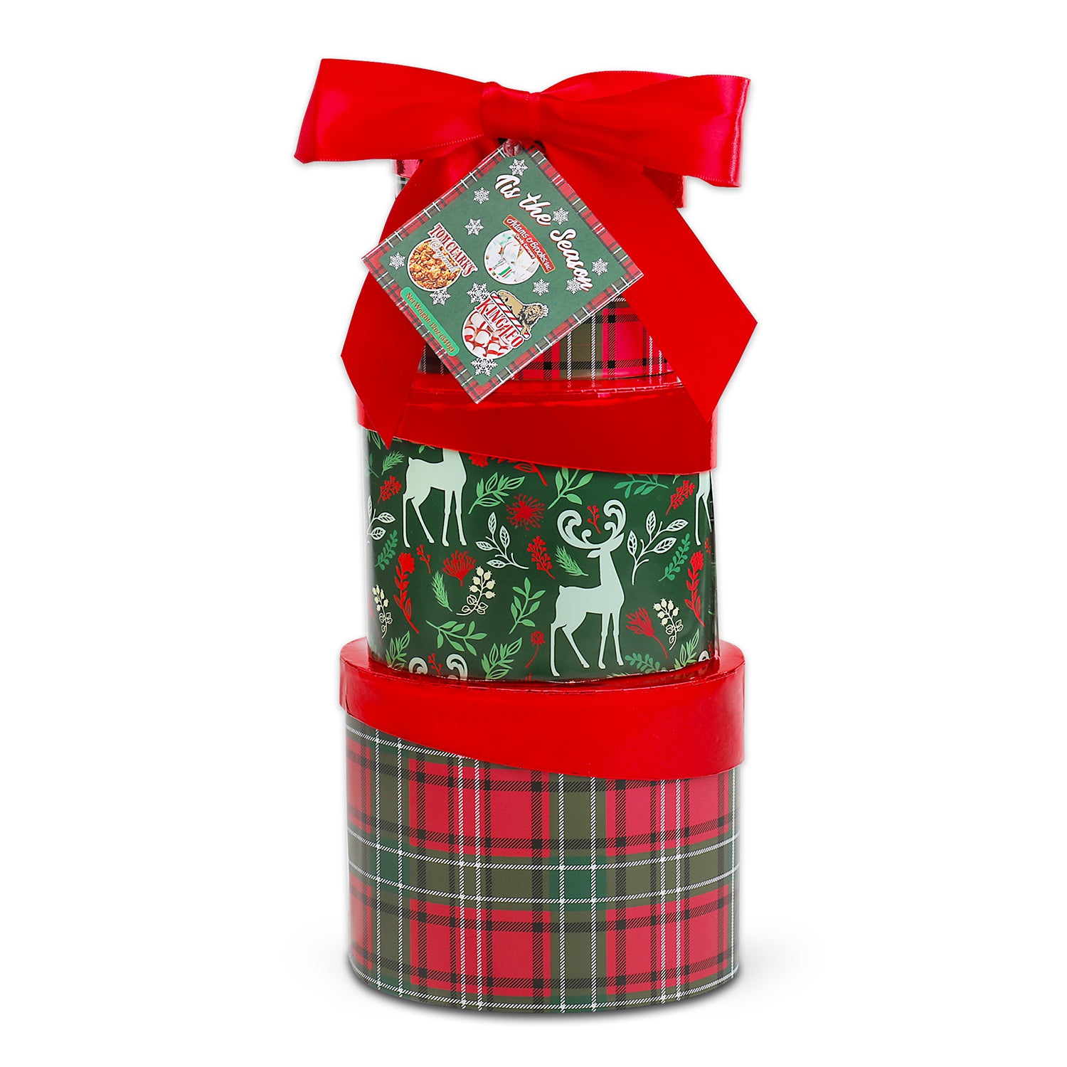 Stack of Christmas-themed gift boxes with a red ribbon and tag on a white background