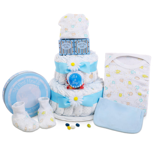 Baby gift set with diaper cake, booties, bib, and rattle on a white background