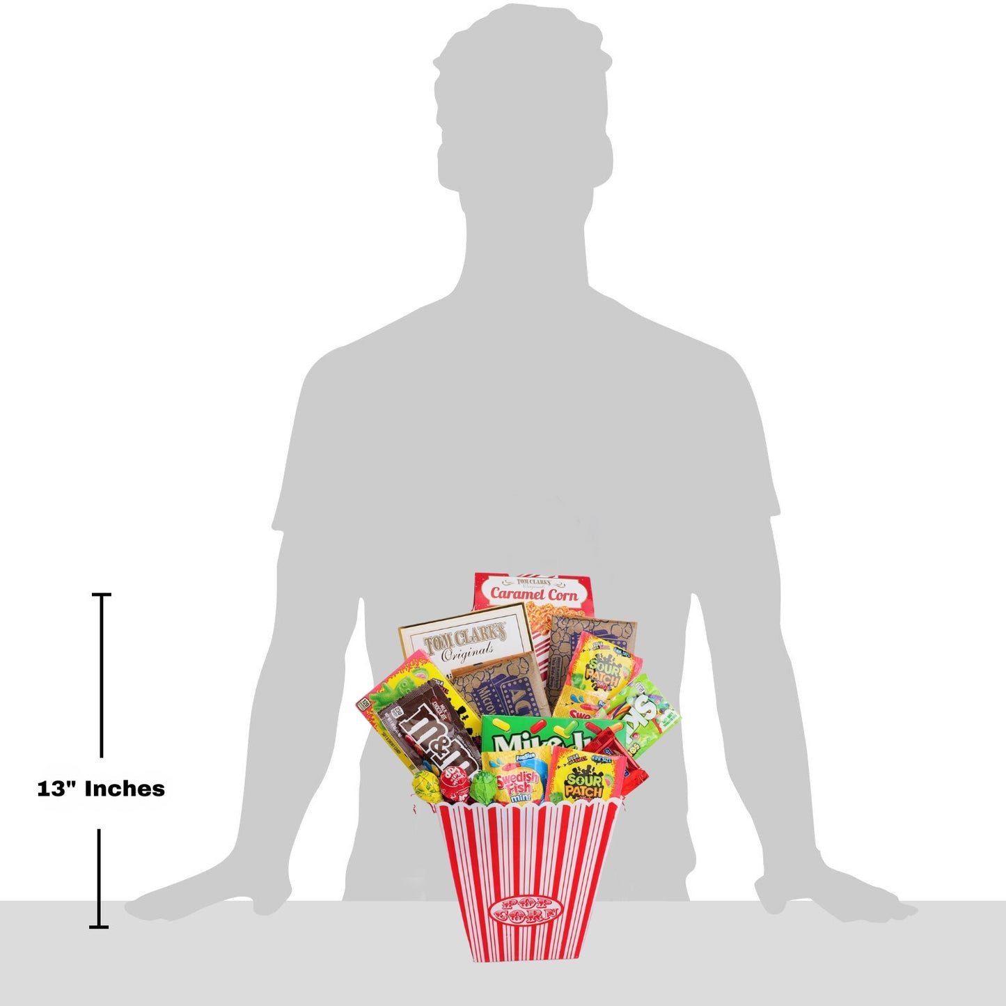 gift basket displayed in front of grey shadow man to illustrate size.